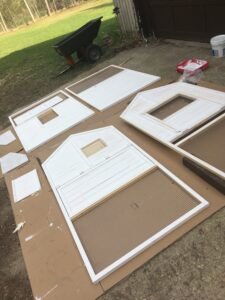 Chicken coop pieces painted