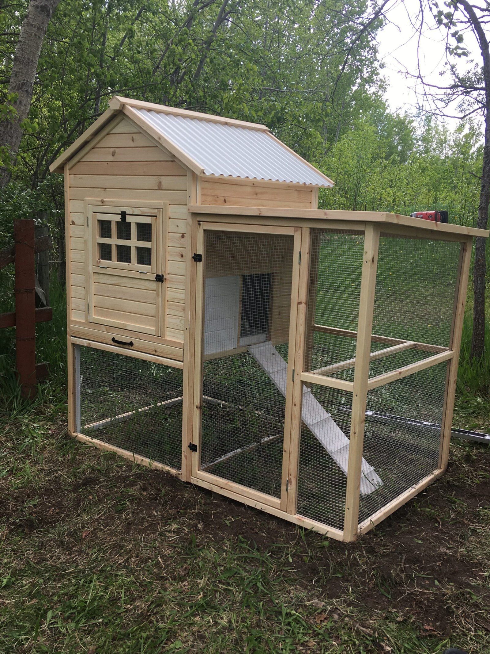 Chicken Coop locked in place with gravel